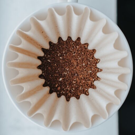 white muffin tray on top of white ceramic mug