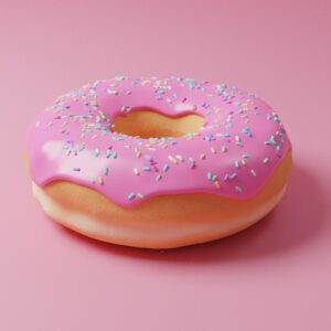 pink doughnut with pink icing on top
