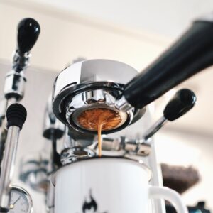 white ceramic mug with espresso