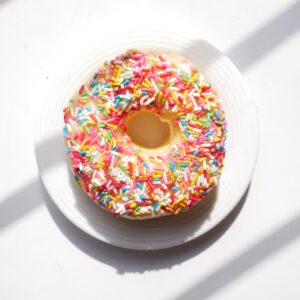 doughnut on white ceramic plate